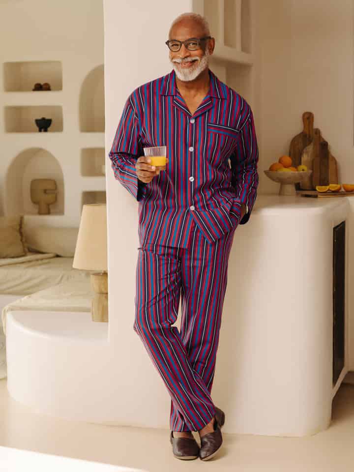 Model wears Mens Navy & Red Club Striped Cotton Pyjamas